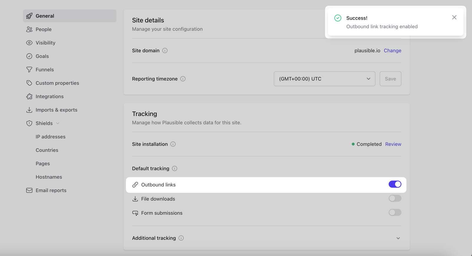 Enable outbound link tracking in Plausible site settings