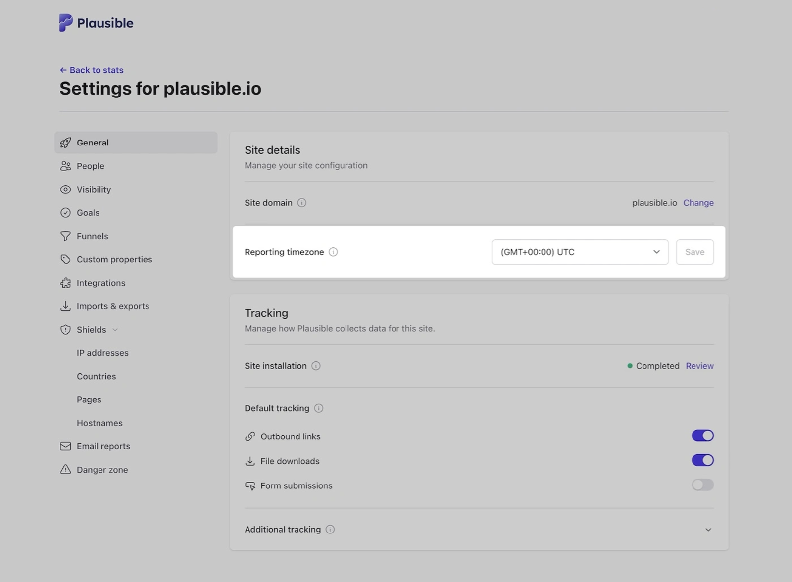 Change the reporting timezone in Plausible site settings